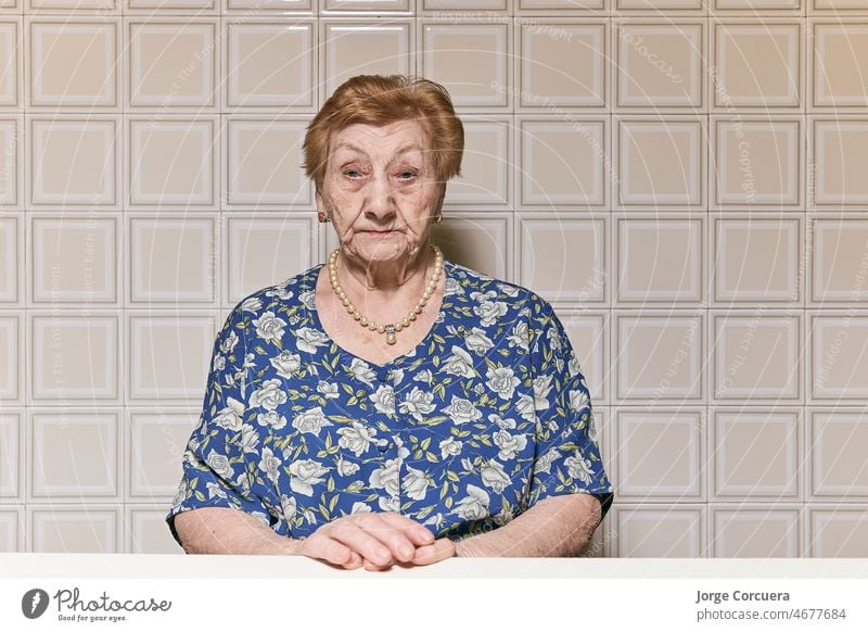 Portrait of an old woman in the kitchen of her house. Old People Person Poor Adult Couple Elderly Face Senior Shelter 90 95 Aged Background Caucasian Closeup