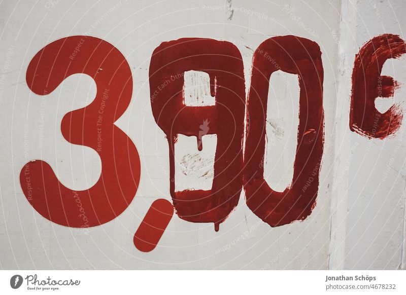 3,90€ in red writing on white wall 3.90€ Euro Money Amount Red Wall (building) Value Costs price Cheap cheap Offer Improvise Save Economy finance Paying