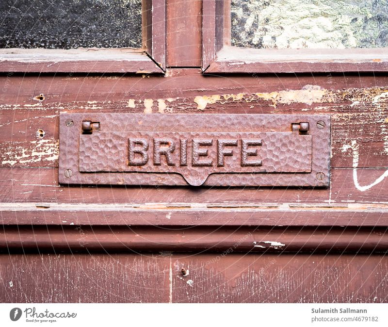 old mail slot on the front door Sign Brown Letter (Mail) Letters writing symbol typo typography letter flap Letter post Letter slot Send letter Interject detail
