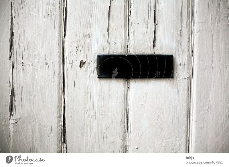 detail 6 Deserted Door Wooden door Mailbox Metal Old Sharp-edged Simple Black White Decline Past Change Colour photo Black & white photo Subdued colour