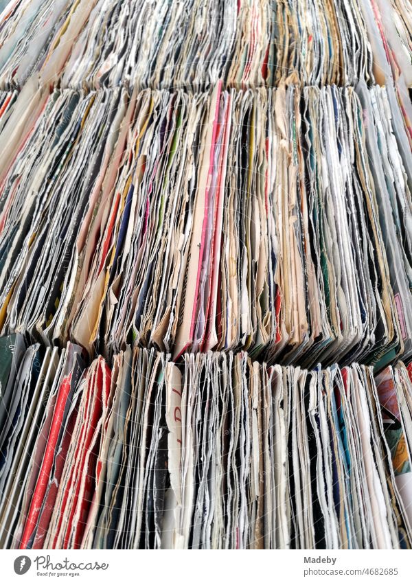 Old records singles from vinyl in paper mills at the flea market and flea market in summer at Golden Oldies in Wettenberg Krofdorf-Gleiberg near Giessen in Hesse