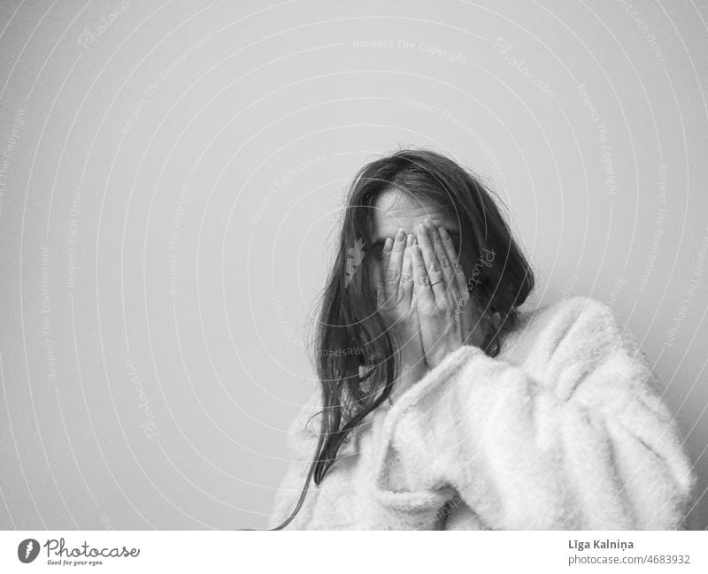 Woman covering face with hands in black and White Sad Emotions Distress sad Grief sad look Girl Face Sadness Human being Loneliness Pain Concern Earnest Stress