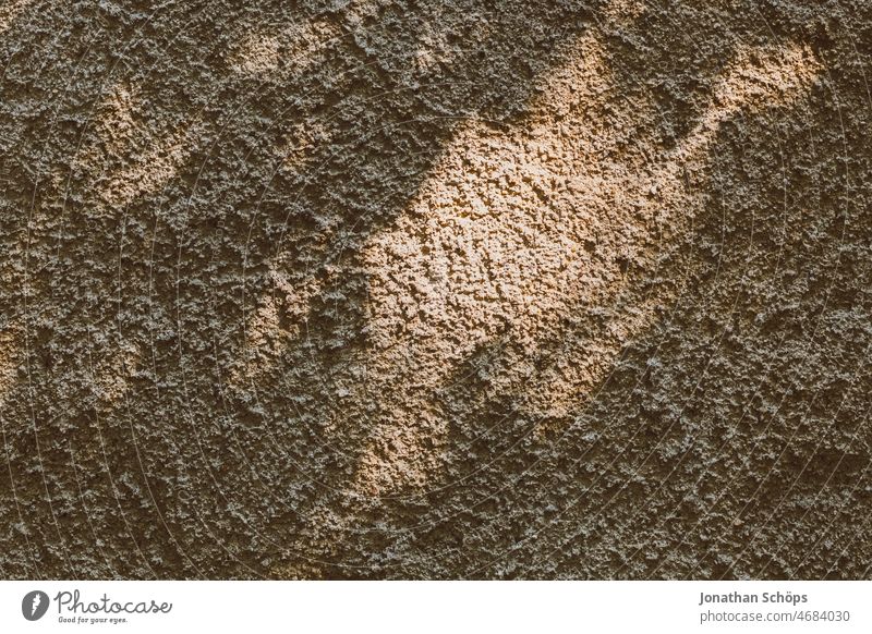 Light spot on wall Patch of light Wall (building) Wall (barrier) Plaster Light (Natural Phenomenon) Sun Shadow Shadow play texture Background picture Brown warm