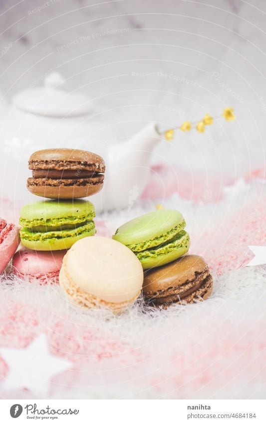 Delicious macarons with a tea in a teapot macaroons french delicious sweet food gourmet dessert party tea party birthday ideas recipe ready to eat tasty variety