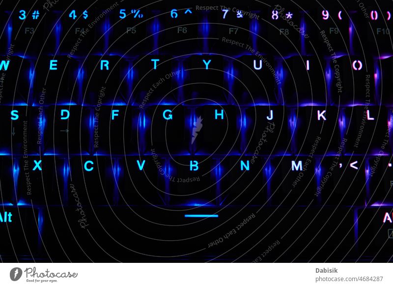 Gaming rgb keyboard on dark background light game gamer button night pc computer mechanical type gaming online service black blue bright color colorful design