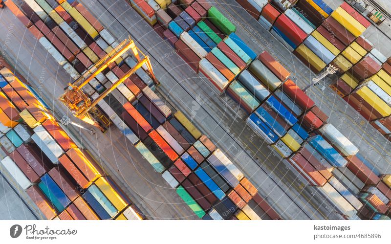 Aerial view of shipping container port terminal. Colourful pattern of containers in harbor. Maritime logistics global inport export trade transportation.