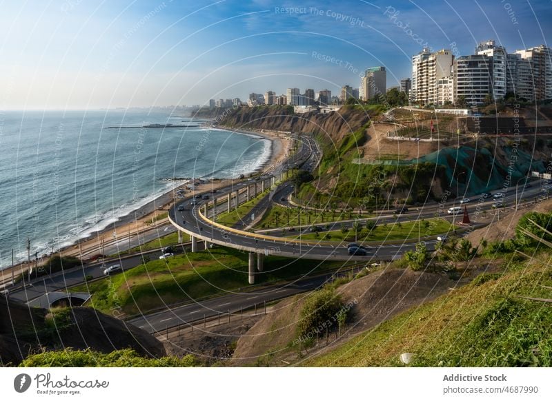 Waterfront with roads and buildings waterfront sea seafront city bridge coastal seaside car vehicle transport malecon lima peru la costa verde shore residential