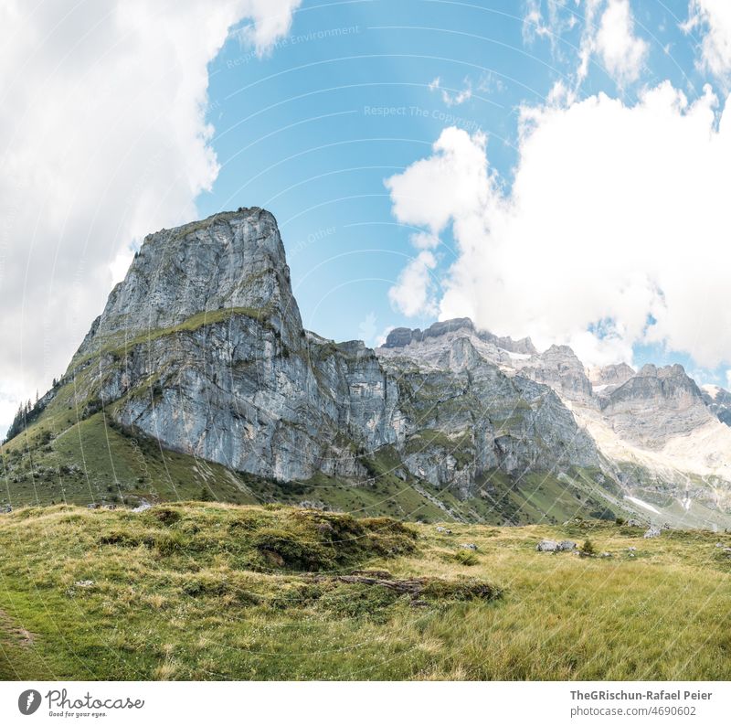 Meadow in front of mountain Mountain Glarus mountains Wall of rock Switzerland Hiking Tourism out Alps Exterior shot Nature Deserted Peak Environment Rock