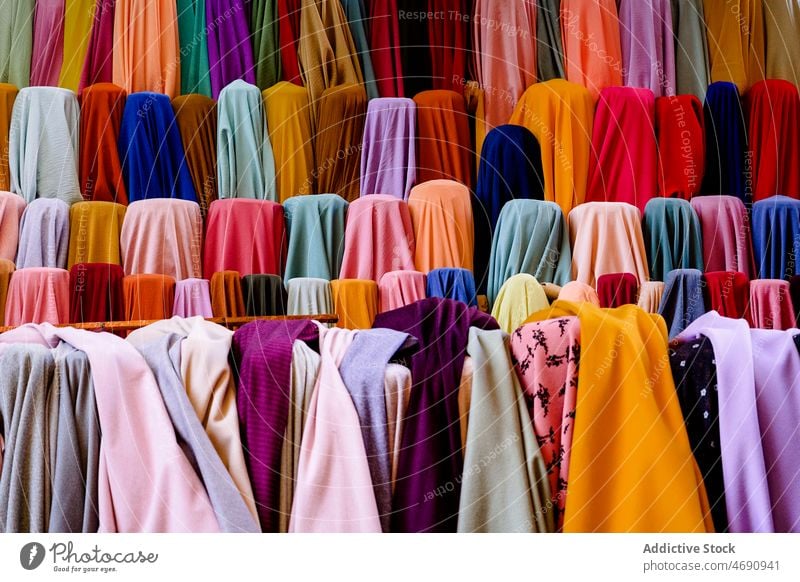 Colorful textile on local market fabric multicolored cloth bazaar offer collection material colorful street sell vivid bright many design set various assorted
