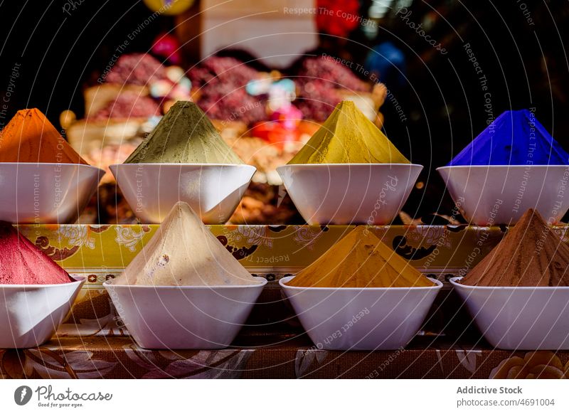 Bowls with various spices on market condiment flavoring bazaar local stall assorted sell seasoning aromatic bowl street city egypt colorful multicolored