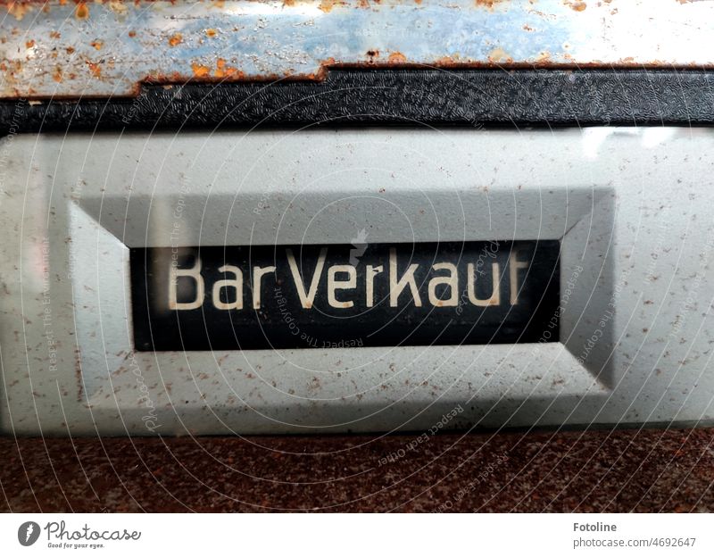 Small detail: "Bar sale" is written on the old, already rusting cash register. Characters Typography Letters (alphabet) Word writing Colour photo Old rusty Rust