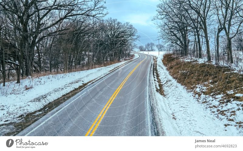 Country road with snow and trees grass tranquility nature frost day beauty background tranquil scene wisconsin temperature sky environment asphalt ice winter