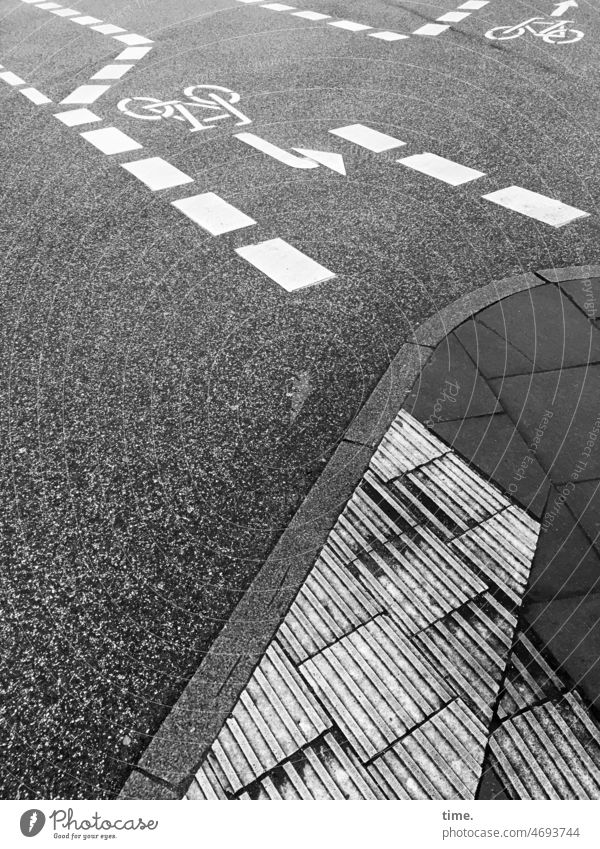Geometry and everyday life Street Cycle path Asphalt lines Stone line guidance Clue Road traffic Arrangement road layout Waymarking worn-out Arrow Turning lane