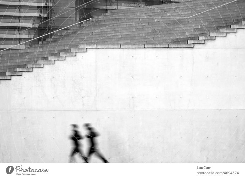 Movement in the government quarter - two blurred joggers in front of a staircase descent Jogging Jogger Walking Runner motion blur Stairs stair treads Sports