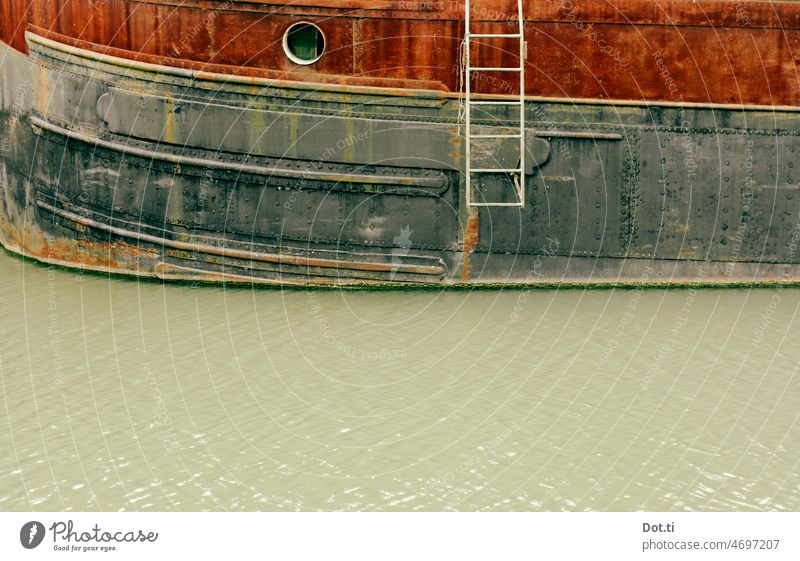rusty ship harbour basins Ladder Porthole Hull dilapidated Water line Old Navigation Deserted Exterior shot Harbour Maritime Colour photo Watercraft Close-up