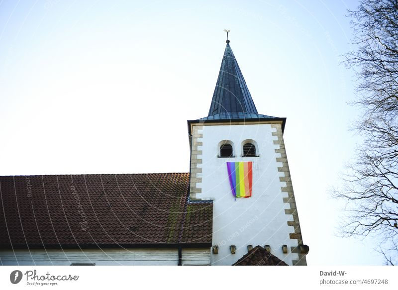 Rainbow flag on a church - sign for tolerance and peace Church Peace Belief Tolerant rainbow flag variety pride Hope symbol concept Homosexual Freedom
