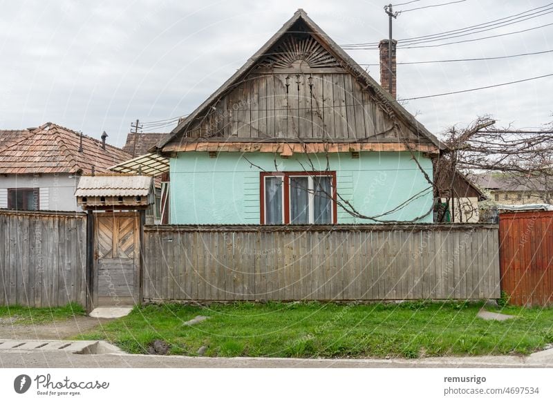 Traditional old house with front fence in a town. Rural scene. 2019 Praid Romania abstract ancient apartment architecture building city cityscape construction