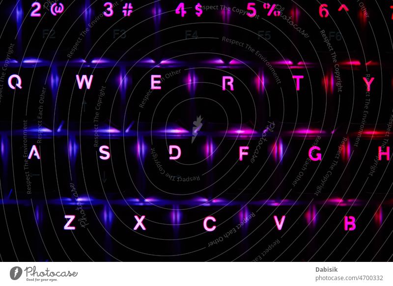Gaming rgb keyboard on dark background light game gamer button night pc computer mechanical type gaming online service black blue bright color colorful design