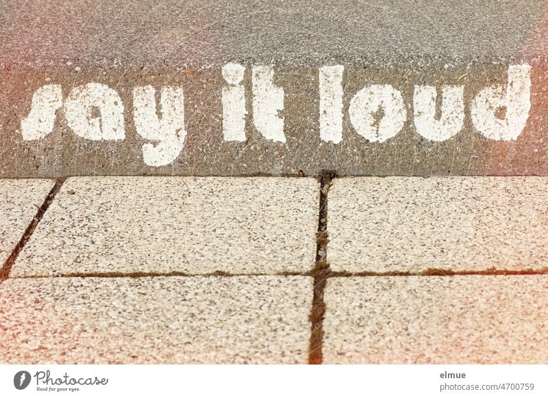 say it loud - written in white block letters on a stair step / request to express an opinion / point of view say it clearly English expression of opinion