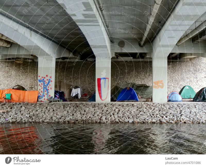 Refuge under a bridge Homelessness Poverty homeless Safe haven Protection Sleeping place Tent Tents Town housing shortage Bridge Water Loneliness Exterior shot