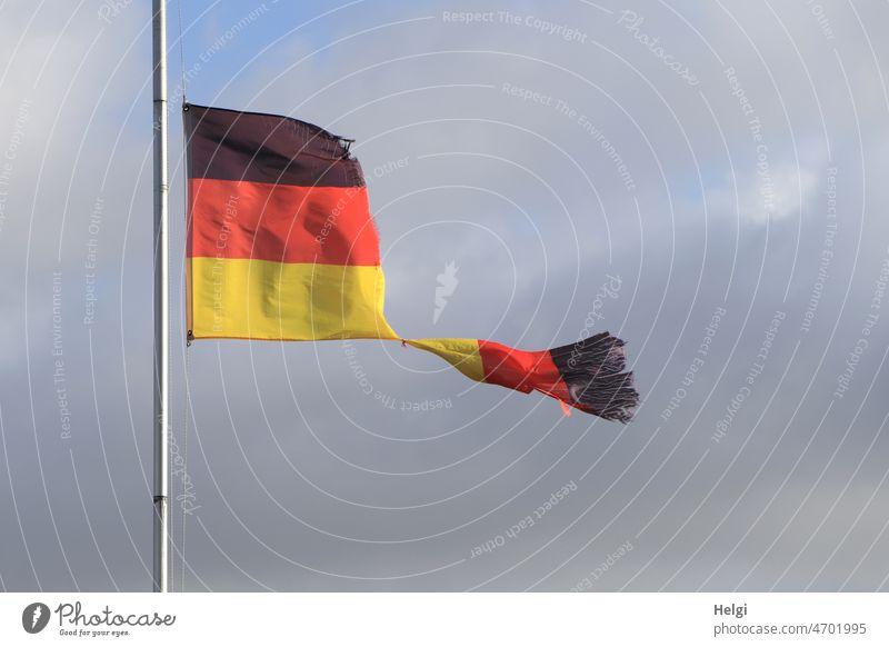 Teakettle | flag - storm torn Germany flag in front of blue gray sky German flag black-red-gold Flag flagpole shredded Broken Gale Wind stormy Judder Sky Clouds