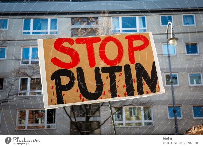 Sign with the inscription " Stop Putin "Demonstration against Putin's bloody war of aggression in Ukraine stop putin Ukraine war Ostracism protest War Russia