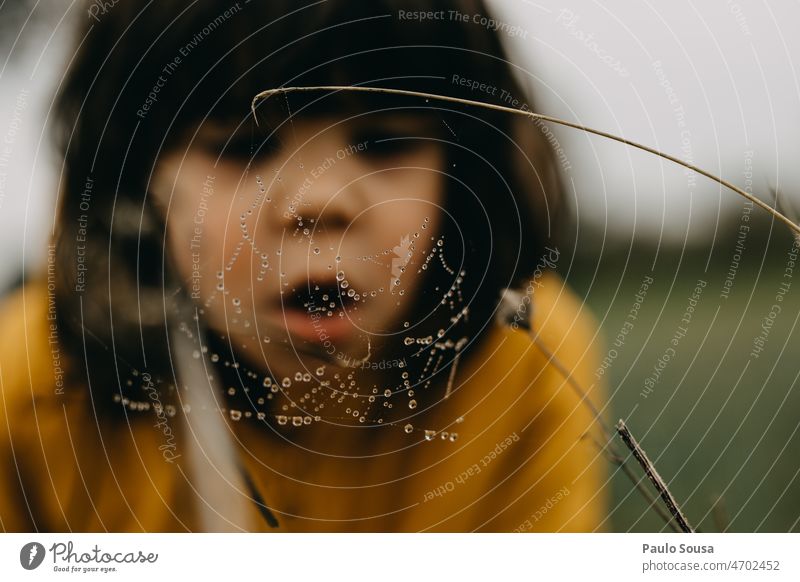 Cute girl watching Spider web Child childhood Yellow Spider's web spiderweb Nature Curiosity explore Caucasian Leisure and hobbies Authentic Infancy Human being