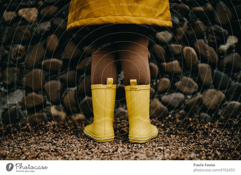 Girl with Yellow rubber boots Rubber boots Midsection Close-up Boots Footwear Exterior shot Colour photo Rain Feet Multicoloured Human being Bad weather Joy