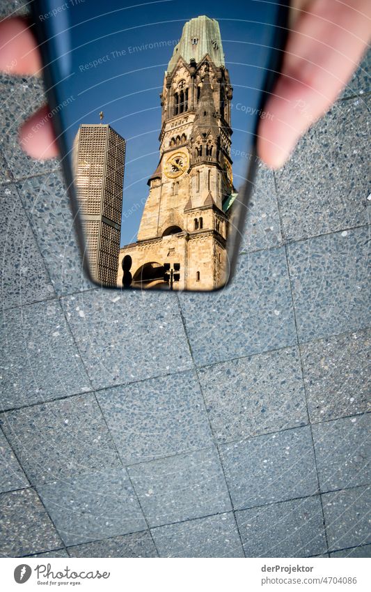 Memorial church in the reflection of a smartphone in Berlin I Berlin center Vacation & Travel Beautiful weather Tourism City trip Freedom Sightseeing Adventure