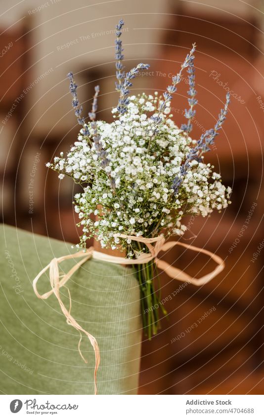 Bouquet of Gypsophila on chair gypsophila flower bouquet decor festive wedding event celebrate floral decoration blossom room seat fragrant small tender style