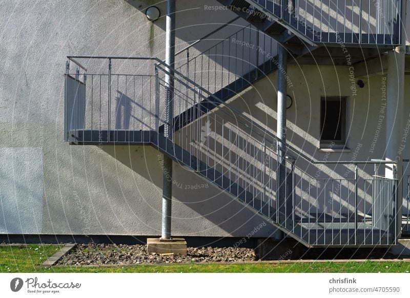 Exterior staircase on residential house with shadows cast Stairs House (Residential Structure) Apartment Building Office Shadow Stage Ladder Landing Upward