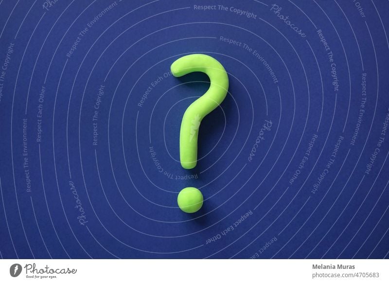 Green question mark on blue background. Abstract 3d model, mock-up of interrogation point. Asking for important  information, solution, answer concept. ?