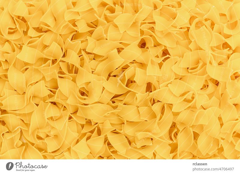 tagliatelle noodels texture diet Nutrition eat durum wheat Italian Italy carbohydrates food noodles pasta vegetarian raw dough uncooked egg spaghetti macaroni