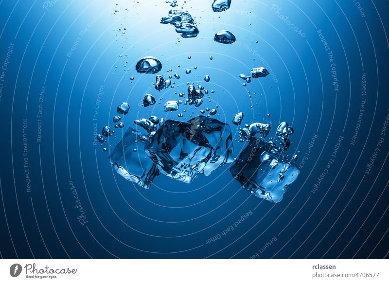Ice cubes falling in water motion bubble blue transparent liquid fresh wet splash diving air deep oxygen drinking water clearCrystal clear ice cream frozen
