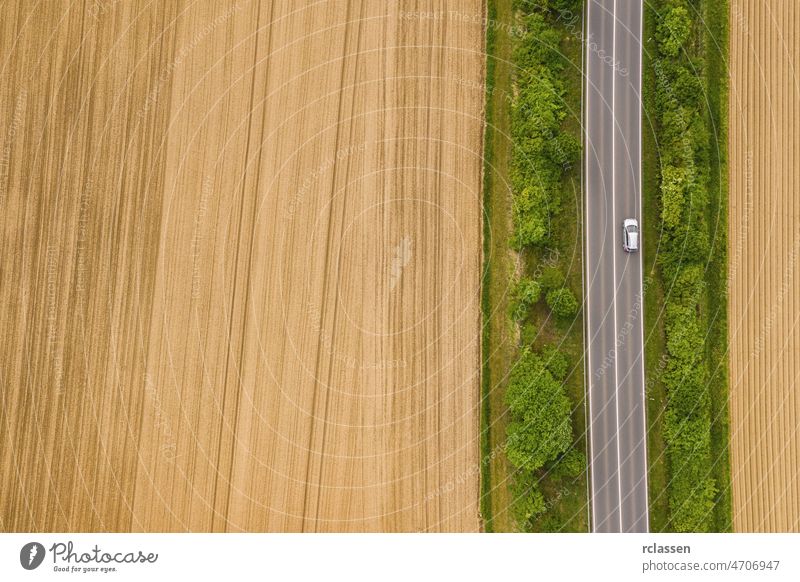 Aerial view of car moving on the road. Road traffic concept background. including copy space drone freeway trip aerial view agricultural automobiles cars