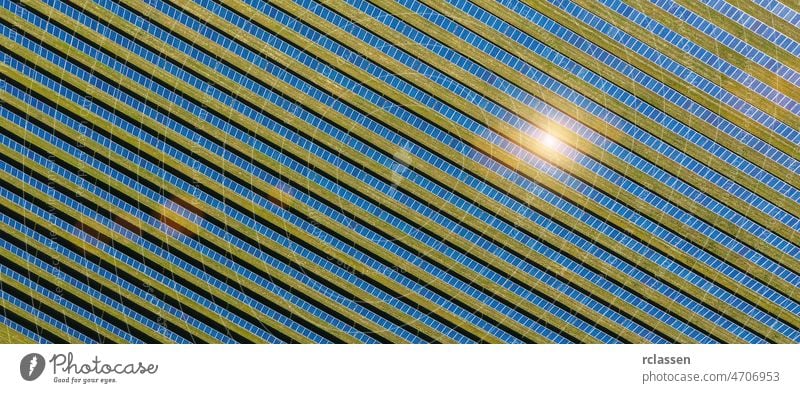 Solar panel, photovoltaic, alternative electricity source, banner size solar field drone energy industry blue sun flare sunlight solar panel cell clean