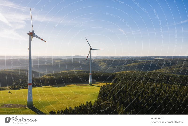 Wind turbine from aerial view - Sustainable development, environment friendly, renewable energy concept. wind power fuel alternative forest sunset drone clean