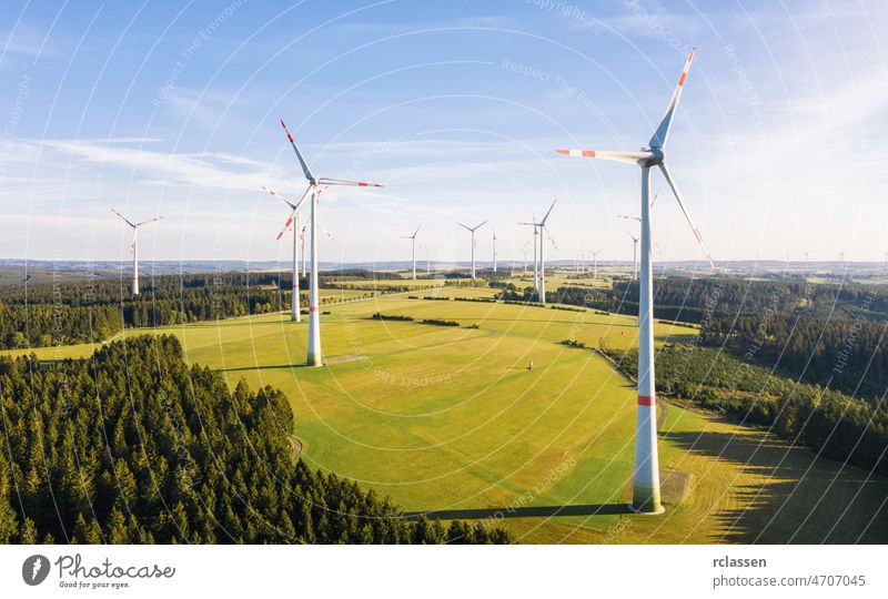 Windmills for electric power - Energy Production with clean and Renewable Energy - aerial drone shot wind turbine wind farm energy environment fuel alternative