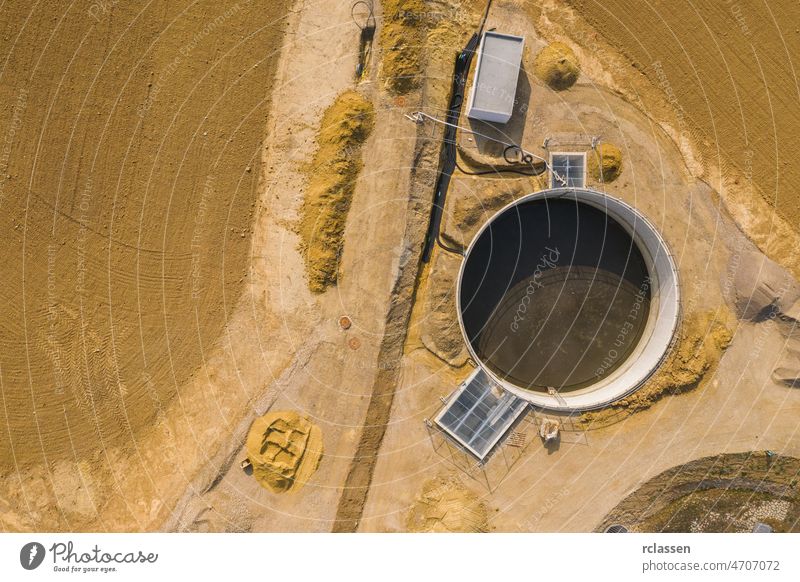 Top down aerial drone image of a sewage treatment (water reclamation) plant Building site building site wastewater municipal pollution aeration aerial view