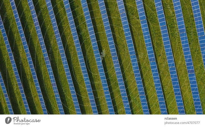 aerial view with solar cell farm at Germany panel field drone power sustainable environmental energy plant sun wind ecosystem industry photovoltaic nature