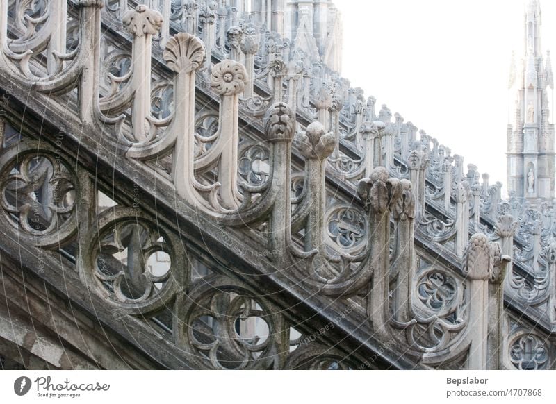 Detail of the Milan cathedral Italy above architecture church commemorative faith high historic holiness holy isolated milano monument religion sculpt sculpture