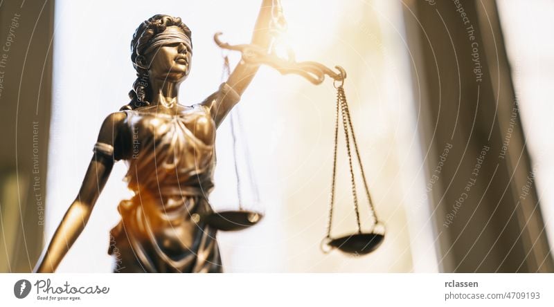The Statue of Justice - Lady Justice or Iustitia / Justitia the Roman Goddess of Justice lawyer justice litigation concept courtroom condemn judgment judicial