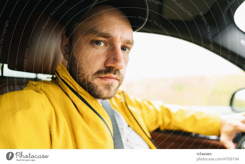 Angy young man solo traveler taking selfie in the car - Adventure wanderlust concept on the road angry portrait aggressive person hipster sad taking a photo