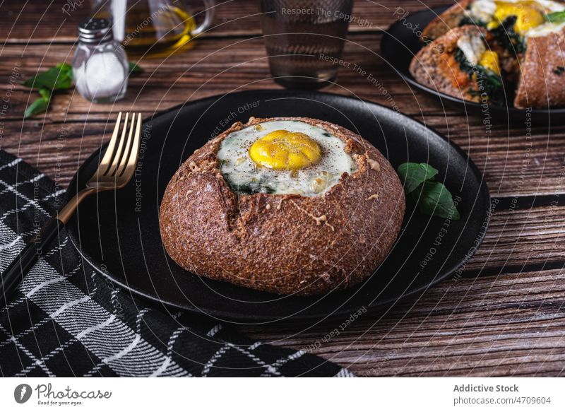 Delicious bread with egg in restaurant stuffing dish meal serve food gastronomy culinary cuisine light tableware palatable calorie flavor yummy delectable tasty