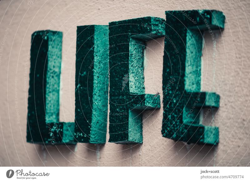 LIFE is hard to miss with capital letters Word Characters Capital letter Green English Life Styrofoam Self-made Weathered Three-dimensional Creativity