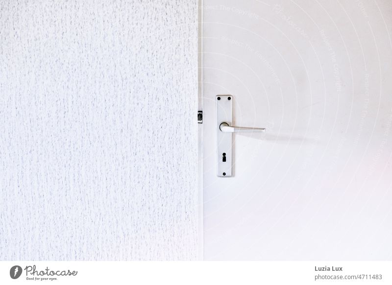 An open white door, textured wallpaper behind it. door leaf door handle Old Detail Wallpaper structured wallpaper White Entrance Room door Wood Varnished