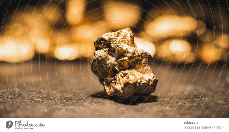 big gold nugget mine ore closeup finance money mineral jewelry golden wealth action assurance background backing balance bank banking bright business capital