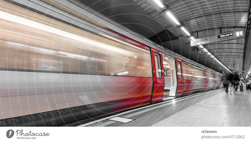 London tube opening the door motion blur underground train station travel fast traffic move transport England Great Britain Subway red blurred city commuter uk