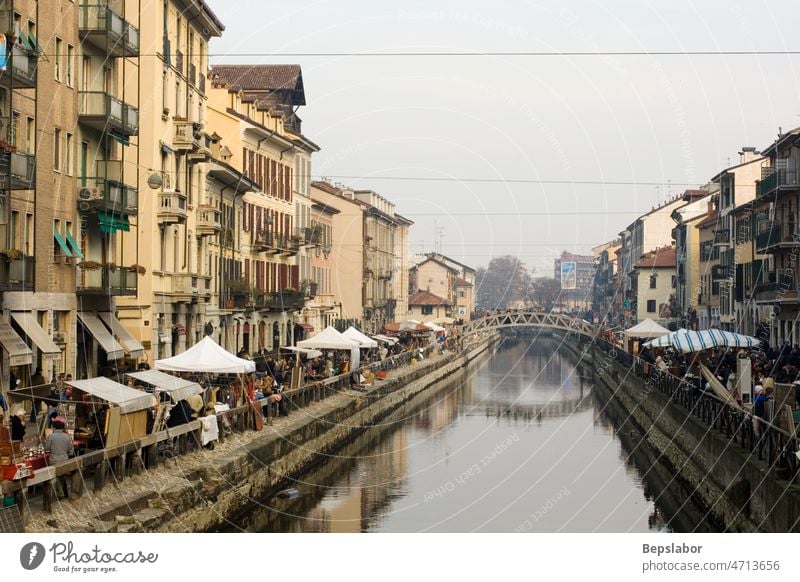 View of the Naviglio, the river canal in Milan - Italy aqua city cloud darkness dock fleet markets milan milano urban walking water building italy