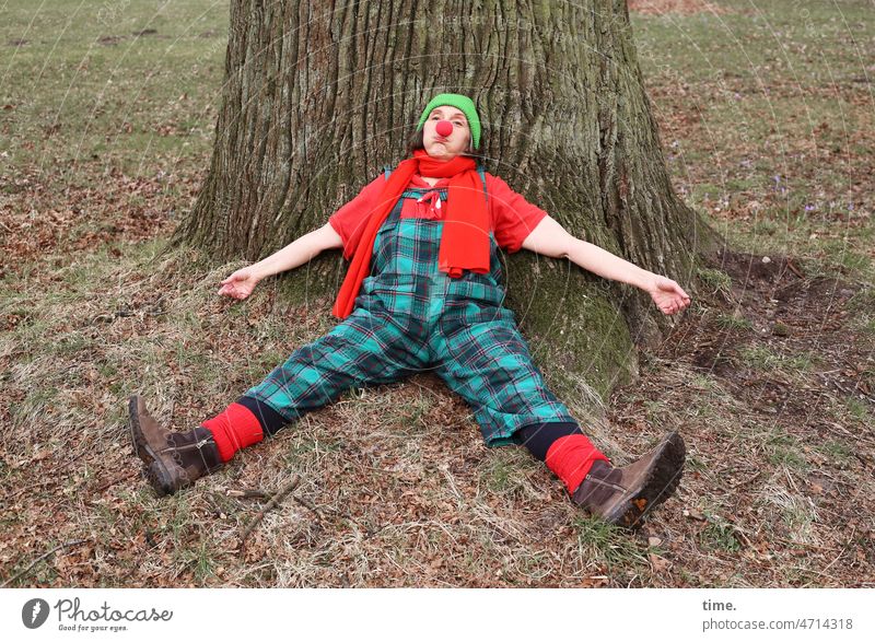 Art break | Clowns in the park (3) facial expression exhausted Tree trunk Woman portrait Park Actor Meadow Sit Break rest Clown costume